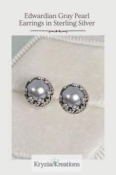 These vintage style gray pearl stud earrings radiate a bit of romantic mystery with their dove gray color and the intricate settings.   See and shop these Edwardian Gray Pearl Stud Earrings at www.KryziaKreationsStudio.com Vintage Silver Pearl Earrings For Formal Occasions, Antique Silver Pearl Earrings For Anniversary, Elegant Round Pearl Earrings With Intricate Design, Victorian Silver Pearl Earrings For Anniversary, Silver Victorian Pearl Earrings For Anniversary, Ornate Silver Pearl Earrings For Formal Occasions, Elegant Silver Filigree Pearl Earrings, Elegant Silver Pearl Earrings With Filigree, Elegant Antique Silver Earrings As Gift