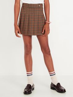 elasticized waist decorative button tab flared pleated skirt all-over plaid sits below belly button relaxed through hip and thigh hits above knee models are approx.  4’3” – 4’8” and wear size m (8)machine wash according to the care instruction label Pleated Skirt Plus Size, School Pants, Thanksgiving 2024, Kids Plaid, Navy Girls, Plaid Pleated Skirt, Belly Button, Summer Sale, Toddler Boys