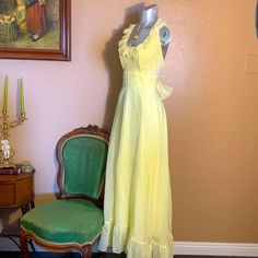 Amazing Find. Vintage 1960's/1970’s Yellow Ruffled Halter Gown. Cotton Blend. Bow Tie On Back. See Pics For Material Detail. I Love The Open Back. Very Pretty Vintage Dress From The 70’s In Excellent Like New Condition. Hurry This Wont Last! Sz 11/12 Mae By Courier California. Yellow Silk Dress, Silk Yellow Dress, Halter Gown, Vintage Dress, Yellow Dress, Silk Dress, Bow Tie, Vintage Dresses, Cotton Blend