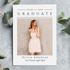 an image of a woman in a dress on the cover of a class graduate magazine