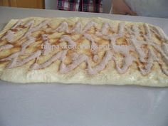 an uncooked pastry sitting on top of a counter