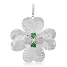 Some call her lucky! Keep your good fortune close by popping this charm on a bracelet or necklace. She'll pair delightfully with green gemstones and diamonds. Available in 14k yellow, rose, or white gold .50ctw emerald .25ctw diamonds Charm measures 1.4" x 1.4" Enhancer bail By Curated by AB Green Charms Jewelry For Good Luck, White Gold Fine Jewelry With Flower Charm, Elegant Good Luck Jewelry With Flower Charm, Sterling Silver Green Jewelry For Good Luck, Green Sterling Silver Jewelry For Good Luck, Elegant Green Charms For Gifts, Green Flower Pendant Fine Jewelry, Elegant Good Luck Charms Jewelry, Green Charms Jewelry For Anniversary