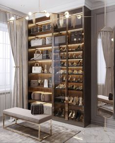 an elegant walk - in closet with mirrored shelves and gold trimmings, filled with shoes