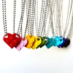 Matching Heart Friendship Necklace Set, Made with Real LEGO® Bricks! ♥♥ This is a beloved bestselling gift. The classic bricks join together to form a heart shape. ♥ We do *not* use fake/imitation bricks. Everything we carry is authentic and handmade-to-order. ♥ Adorable gift for couples, family, and BFFs. ♥ Included are 2 high-quality, beautiful made-in-USA necklaces that will make a whole heart.**SHIPS NEXT BUSINESS DAY** Details: • Choose your favorite colors• Ball Chains are 24” (61 cm)• LEG Matching Gifts For Friend Group, Lego Necklace, Lego Heart, Bff Keychain, Couples Necklaces, Fireboy And Watergirl, Hearts Jewelry, Music Necklace, Friend Stuff