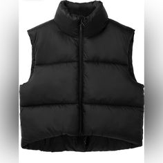 Women’s Black Cropped Puffer Vest Sleeveless Drawstring On Bottom Black Puffer Vest For Spring, Black Sporty Puffer Vest, Sporty Black Sleeveless Outerwear, Black Puffer Vest For Winter, Black Cold Weather Vest Outerwear, Black Puffer Vest For Outdoor, Black Vest Outerwear For Cold Weather, Trendy Black Puffer Vest, Trendy Black Sleeveless Outerwear