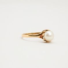 R I N G WITH WHITE PEARL ∙  * Details: Solid Gold ∙ 14K Gold ∙ Yellow Gold * Stones: white pearl * Weight: 0.8 grams * Ring size: 7¾ * Condition: All our pieces are vintage, antique or close to new. The piece undergoes a restoration proces, which includes ultrasonic cleaning and mild polish techniques to enhance the condition of the piece. * All our pieces are vintage and handpicked. We put a lot of effort into finding the most unique and beautiful items for you guys ♥️ Hope you like it A U T H Classic White Gold Akoya Pearl Ring, White Pearl Ring With Prong Setting For Formal Occasions, Classic White Akoya Pearl Ring, Formal White Pearl Ring With Prong Setting, Classic White Pearl Ring, Classic Akoya Pearl Ring For Formal Occasions, Timeless Pearl Ring With Prong Setting For Formal Occasions, Timeless Formal Pearl Ring With Prong Setting, White Akoya Pearl Timeless Ring