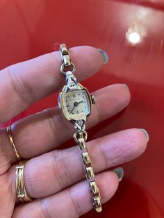 Bulova  A Fine Vintage Ladies watch  2 dainty real diamonds  movement : 21rubies, (highest quality at the time)  case ; 10KRGp yellow gold  band : GEMEX buckle band (expandable band fit 15.5cm -18.5cm) pls see last photos show Art Deco 1940-1960s  Winds and sets well and timekeeping Good.  Oiled & Serviced  Signed Movement, dial , case Cosmetic condition: 90% new (minty ) with minimal scratch on crystal, case and band  Genuine antique- no rewrite of dail or mixed parts  Case size 18-20mm including winding button. note : For vintage watches / antique watches for more than 50 years ,  we will check before shipment for 12 hours, make sure the watch is running , if it's not working , we will cancel your order before ship out , and refund , as we cannot Guarantee time Accuracy as like battery r Luxury Vintage Watch Accessories For Business, Vintage Diamond Jewelry And Watches With Polished Finish, Vintage Diamond Jewelry With Polished Finish, Vintage Diamond Watch With Polished Finish, Vintage Silver Diamond Watch, Vintage White Gold Diamond Watch, Vintage Diamond Watch With Polished Finish For Anniversary, Vintage Diamond Watch For Anniversary, Vintage Diamond Watch