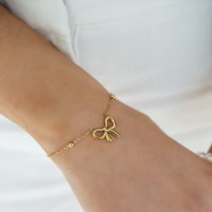 Your wrist will look even better with this adorable bow knot bracelet! Made of titanium steel it layers well with other bracelets or looks lovely on its own. Complete the matching set with the bow knot necklace. Rose Gold Jewelry With Bow For Gifts, Adjustable Dainty Stainless Steel Charm Bracelet, Dainty Adjustable Stainless Steel Charm Bracelet, Elegant Adjustable Bracelets With Butterfly Charm, Delicate Metal Bracelet As A Gift, Dainty Butterfly Charm Bracelets For Gift, Dainty Butterfly Charm Bracelets As Gifts, Delicate Metal Bracelet As Gift, Delicate Metal Bracelet For Gift