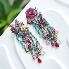 Kindly check out the Jhumka Kundan earrings section, where you can find more unique designs!  https://www.etsy.com/shop/VelvetVineEarrings?ref=seller-platform-mcnav&section_id=50758956 keywords: Jhumka Kundan earrings/statement colorful quartz dangles/wedding jewelry/cultural accessory/traditional anniversary/multi-stone handmade  👄Item details:  Originally designed by me and crafted in our Denver, Colorado studio, our family business thrives with the invaluable contributions of my brother and cousin, who play key roles in creating our items and maintaining our Etsy shop. Specifications: *Length:55mm *Width: 35mm *Materials: Stainless steel, vibrant quartz stones, handmade settings, featuring original vintage Kundan Jhumka designs.  Shipping: *Ships within 7 days from Denver, with free do Jhumka Designs, Quartz Color, Kundan Earrings, Earrings Statement, Denver Colorado, Multi Stone, Family Business, Quartz Stone, Statement Earrings