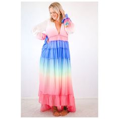 Look Whimsical And Colorful In This Maxi Dress! Be Vacation Ready On The Beach In This Colorful Stunner. Size Bust Waist Hips S (4-6) 34-35 27-28 36-37 M (8-10) 36-37 29-30 38-39 L (12-14) 38-40 32-33 41-42 Liz Is 5'7 And Wears A Size Medium Multicolor Long Sleeve Dress For Beach Party, Rainbow Long Sleeve Summer Dress, Long Sleeve Rainbow Summer Dress, Long Sleeve Rainbow Dresses For Summer, Flowy Long Sleeve Dress For Beach Party, Rainbow Maxi Dress For Vacation In Spring, Rainbow Maxi Dress For Spring Vacation, Rainbow Summer Dresses For Vacation, Summer Beach Dresses In Rainbow Color