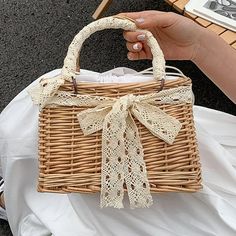 Description: High Quality Material This beautiful handbag is made of natural straw, handwoven, elegant and stylish. With Two Handles: This straw purse is with 2 handle, very portable for daily use. Large Capacity: This gorgeous pouch is in size 9.06inchx4.72inchx6.3inch, large capacity for storage your phone, wallet, umbrella, sun glasses and cosmetic, etc. Great Decor: This tote bag can also be a perfect home decor for storage, and toy organizer, etc. Wide Applications: This charming pouch case Rattan Handbags, Waist Bag Women, Wicker Box, Toy Organizer, Straw Purse, Tote Organization, Basket Tote, Woven Handbags, Straw Tote Bag