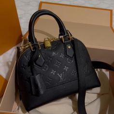 This Beautiful Lv Bag Comes Brand New With Box, Dust Bag And Removable Strap For Crossbody. It Is Real Authentic Caviar Leather With Accessorized Lock And Key As Well. Light Luxury Black Bag With Branded Hardware, Black Shoulder Satchel, Black Monogram Canvas Top Handle Bag, High-end Black Monogram Canvas Bag, Black Monogram Canvas Bag With Branded Hardware, Black Monogram Canvas Bag For Everyday Luxury, Luxury Handheld Shoulder Bag With Original Box, Black Monogram Canvas Luxury Bag, Black Monogram Canvas Satchel With Gold-tone Hardware