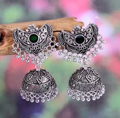 * Item  Description - * Material-  Silver plated oxidized earrings  * Weight -  25.20  Grams  * Inches -   1.7   Inches  * Length -  4.5 Centimeter  * Width -    2.0  centimeter  * Pattern -  Traditional wear, Party wear, Wedding gift, Daily wear, Casual wear, birthday gift, promise gift, gift for her,  Best price guaranteed  We strive continuously to serve our customers better and keep updating our shop with new designs regularly .  We can also supply in wholesale quantities. To enquire about w Bohemian Silver Dual-tone Earrings, Dual-tone Chandbali Danglers, Bohemian Metal Chandbalis Drop Earrings, Silver Chandelier Earrings With Oxidized Finish For Festive Occasions, Bohemian Festive Jhumkas, Silver Oxidized Chandbali Chandelier Earrings, Silver Chandbali Chandelier Earrings With Oxidized Finish, Intricate Metal Chandbalis Drop Earrings, Intricate Design Metal Chandbalis Drop Earrings