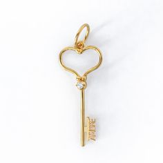 "Keywords" Collection  If there's a door instead of a wall, just find the KEY!  What are the keywords in your life?  In the glow of AMORE, every moment feels timeless, and every journey is worth taking.  Medal: 3. 6cm Length 100% 14K Gold Accented with Zirconium Stones  Crafted from pure 14K gold that won't tarnish over time and retains its value.  Versatile in design: wear it as a pendant or as a charm on your bracelet. August Birthstone Jewelry, July Birthstone Jewelry, Jewelry Ring Box, Pearl Jewellery Earrings, Men's Jewelry Rings, Timeless Jewelry, The Glow, August Birth Stone, Evil Eye Jewelry