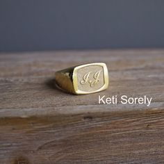 Personalized modern  Signet ring for man. Ring will be miraculously detailed by our talented jewelers. Amazing custom made jewelry for birthdays, Father's day, Christmas, graduation and etc. Metal options:  *Sterling Silver  *Sterling Silver with yellow gold overlay * 10K solid gold (yellow or white) * 14K solid gold (yellow or white) * 18K solid gold (yellow or white) Ring face size: 18mm x 14mm 2-3 initials per ring. Production time: 2-3 weeks. 14k Yellow Gold Signet Ring With Initials, Personalized 14k Yellow Gold Signet Ring, Anniversary Initial Ring With Rectangular Shape, Custom Gold Jewelry With Engraving Option, Gold Engraved Initials Ring In 14k, Gold Sterling Silver Engraved Initial Ring, Yellow Gold Initial Ring With Engraving For Anniversary, Heirloom Style Gold Initial Ring In Sterling Silver, Heirloom Gold Initial Ring In Sterling Silver