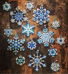 several snowflakes are arranged on the ground