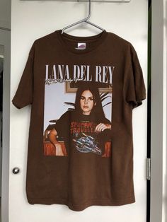 Lana del rey clothing graphic T shirt  Lana Del Rey Shirt  blue banisters Album Shirt Lana Del Rey Shirt  Gift for men  women Unisex T shirt Easy 30 day return policy Lana Del Rey Graphic Tee, Lana Del Rey Tee Shirt, Lana Del Ray Merch, Lana Del Rey Graduation Cap, Graphic T-shirts, Lana Del Rey Clothes, Lana Del Rey T Shirt, Lana Shirt, Lana Del Rey Shirt