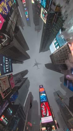 an airplane flying through the middle of a city