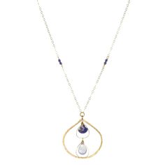 A large shimmering teardrop pendant cradles lapis and natural chalcedony gemstones within, reminiscent of a gentle spring rainfall. Delicate gold-filled wire details add an extra touch of artistry. Shimmering gold chains, adorned with lapis details, complete this show stopping piece. • 14k gold filled • Lapis and natural chalcedony • Pendant Dimensions: about 1.25" • Length: 17" Gold Teardrop Drop Necklace With Natural Stones, Droplet Necklace, Teardrop Pendant, Jewelry Repair, Ring Bracelet, Semi Precious Gemstones, Earring Necklace, Ring Gift, Personalized Jewelry