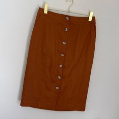 New, With Original Tags Beautiful Color! Front Button Detail/Closure High Rise Very Light, Breathable & Comfortable Side Pockets Bin 86 Spring Button-up Brown Skirt, Brown Button Closure Skirt For Summer, Fitted Cotton Skirt With Buttoned Pockets, Brown Skirt With Button Closure For Summer, Fall Pencil Skirt With Buttons, Brown Fitted Button-up Bottoms, Brown Knee-length Skirt With Button Closure, Cotton Workwear Skirt With Button Zip Fly, Fitted Skirt With Button Closure For Day Out