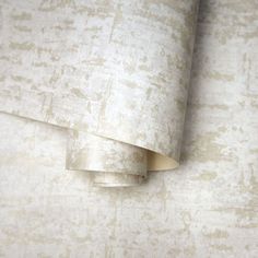 the wall paper is white and beige in color