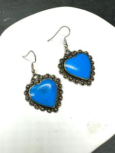 Enhance your style with our turquoise earrings, a must-have piece for lovers of jewelry with natural charm. Each turquoise women's earring is carefully designed to bring a touch of boho elegance to your look. These boho chic earrings are ideal for a jewelry gift or simply to enrich your personal collection. The turquoise earring evokes vibrant and calming colors, perfect for a bold or understated style. Give them as a gift for her and be sure to make a statement with a piece of jewelry that embo Bohemian Blue Heart Earrings For Gifts, Blue Bohemian Heart Earrings For Gift, Blue Bohemian Heart Earrings As Gift, Bohemian Blue Heart Earrings As Gift, Blue Oxidized Finish Jewelry, Artisan Turquoise Nickel-free Earrings, Artisan Nickel-free Turquoise Earrings, Blue Oxidized Finish Earrings, Artisan Turquoise Pierced Earrings