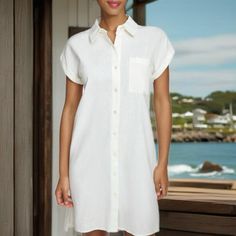 Elevate Your Summer Wardrobe With This Stunning Calvin Klein Shirt Dress. The Dress Features A Button-Front, Midi Length, Collared Neckline And Short Sleeves. The Dress Is Made Of A Woven Linen Rayon Blend, Making It Perfect For Summer. The Dress Comes In A Size 4 (Small) Gorgeous White Cream Color! New! $99 Tag Please See Measurements In Pics. Solid Color Shirt Dress With Pockets For Beach, Shirt Dress With Pockets For Beach, Beach Shirt Dress With Pockets, Fitted Shirt Dress With Pockets For Vacation, Casual White Shirt Dress With Buttons, Button-up Shirt Dress In Solid Color For Beach, Fitted Shirt Dress With Pockets For Beach, Button-up Shirt Dress For Beach In Solid Color, Knee-length Shirt Dress With Buttons For Beach