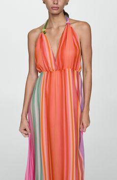 Colorful stripes splash bright energy onto this maxi-length sundress with a stunning open back. Ties at neck Halter neck Adjustable tie straps Lined 100% polyester Machine wash, line dry Made in Turkey Vibrant Summer Maxi Dress For Parties, Summer Party Vibrant Maxi Dress, Vibrant Summer Party Maxi Dress, Multicolor Backless Beachwear Dress, Chic Multicolor Maxi Dress For Beach Cover-up, Chic Orange Halter Dress For Summer, Multicolor Halter Neck Maxi Dress For Beach Season, Multicolor Backless Dress For Beach Party, Multicolor Halter Neck Dress For Summer Parties