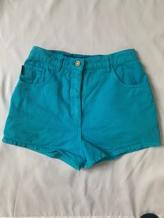 Glorious 1980s teal denim hot pants shorts by 'outpost'.  Marked size 10, waist approx 26", 12" waistband to hem.  In very good vintage condition. Fitted High Waist Cotton Jean Shorts, Fitted High-waist Cotton Jean Shorts, Retro High Rise Cotton Shorts, 90s High-waist Cotton Jean Shorts, Green Retro Cotton Shorts, Green Cotton Retro Shorts, Retro High Waist Cotton Shorts, Retro High Waist Jean Shorts For Summer, Retro High-waist Jean Shorts For Summer