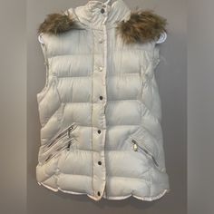 Brand New Never Worn! Hooded Puffer Vest For Fall, Beige Winter Vest For Cold Weather, Beige Vest For Winter Cold Weather, Beige Vest For Cold Weather And Winter, Beige Vest For Cold Weather In Winter, Trendy Beige Winter Vest, Padded Collar Vest For Cold Weather In Fall, Fall Cold Weather Vest With Padded Collar, Fall Vest With Padded Collar For Cold Weather