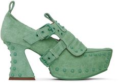 Paneled suede heels in green. Studs throughout. · Pointed square toe · Detachable pin-buckle panel at vamp · Pull-loop at vamp and heel collar · Leather lining · Covered block heel with rubber injection · Covered platform midsole · Leather outsole · Platform: H1.5 in · Heel: H3.5 in Supplier color: Teal Green Pumps, Suede Fashion, Mary Jane Heels, Suede Heels, Platform Heels, Black Heels, Leather Heels, Pumps Heels, Block Heels