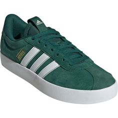 Show off those iconic 3-Stripes against a soft, suede backdrop. These adidas trainers are refined yet easy to wear. The suede upper is lined for comfort and lightly cushioned to keep you moving freely through your routine. The Vulcanised rubber outsole looks at home at the skate park and on the street. Green Adidas Lace-up Skate Shoes, Adidas Lace-up Skate Shoes With White Sole, Synthetic Lace-up Skate Shoes With Three Stripes, Adidas Three Stripes Skateboarding Sneakers, Lace-up Skate Shoes With Three Stripes Branding, Adidas Synthetic Skate Shoes For Sports, Adidas Lace-up Sneakers For Skateboarding, Adidas Lace-up Skateboarding Sneakers, Lace-up Skate Shoes With Three Stripes