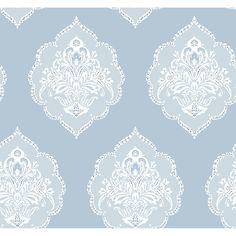 a blue and white wallpaper with an ornate design