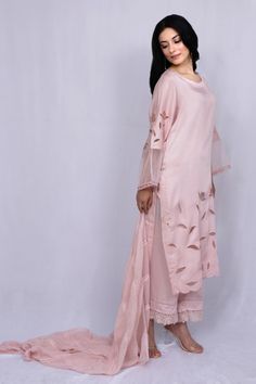 Pastel pink kurta with floral cutwork and sheer sleeve hem detailing. Paired with tonal pant and kota dupatta.
Component: 3
Type Of Work: Floral
Neckline: Round
Sleeve Type: Full sleeves
Fabric: Modal Satin, Kota, Organza
Color: Pink
Other Details: 
Sheer sleeve hem
Nalki work or neckline
Scallop hem on kurta
Occasion: Puja - Aza Fashions Summer Pink Palazzo Set With Sheer Dupatta, Elegant Pink Palazzo Set For Summer, Elegant Pink Palazzo Set For Spring, Spring Pink Chanderi Sharara, Pink Kurta With Sheer Dupatta For Spring, Pink Kurta With Sheer Dupatta For Summer, Spring Pink Kurta With Sheer Dupatta, Pink Organza Palazzo Set With Sheer Dupatta, Party Sharara With Lace Work