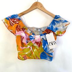 Super Cute And Colorful Is This Crop Top By Zara. Nwt Size Small. Elastic Shoulders And Back So It Stretches Some. Same Day Or Next Day Shipping. K Orange Short Sleeve Crop Top For Summer, Multicolor Floral Print Crop Top For Vacation, Multicolor Floral Print Crop Top For Summer, Zara Multicolor Tops For Vacation, Zara Orange Short Sleeve Tops, Multicolor Printed Summer Crop Top, Zara Multicolor Tops For Day Out, Multicolor Floral Print Cotton Crop Top, Orange Tropical Print Tops For Summer