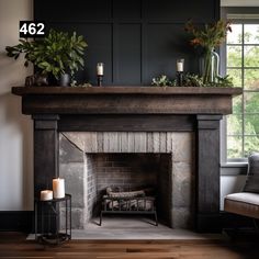 a fireplace with candles and plants on top