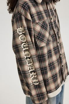 Classic plaid shirt leveled up with the gothic brand slogan. Wear it buttoned up, or as an outer layer to pull off an effortlessly chill vibe. Plaid button-down shirt Classic fit Pointed collar 2 large patch pockets on front Gothic slogan printed vertically on both sleeves B Plaid LOGO brand patch on back Available in 2 colors Composition: 100% Cotton Brand: BONELESS Shipping & Taxes For US Customers: Tax-Free | Duty Fees May Be Assessed For Orders Over $800 For International Customers | Duties Flannels For Men, Brand Slogan, Flannel Outfits Men, Flannel Outfits, Plaid Shirt Men, Shirt Design Inspiration, The Gothic, Tax Free, Fashion Board