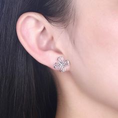 Features: Handcrafted using high-quality sterling silver that promises to last long even after regular usage without damaging Features a beautiful and chic flower design that looks perfect and flattering on everyone The hassle-free push back design makes the stud easy to wear and is good for those who always stay in a rush The intricate design and the simplistic look makes the earring perfect for women of every age A perfect gift option to your loved ones on special occasion to make it memorable Delicate Sterling Silver Earrings For Mother's Day, Sterling Silver Flower Earrings For Anniversary And Mother's Day, Mother's Day Silver Sterling Flower Earrings, Silver Single Flower Earring, Silver Drop Earrings For Mother's Day, Silver Flower Earrings For Mother's Day Anniversary, White Gold Earrings For Mother's Day, Silver Minimalist Flower-shaped Earrings, Silver Flower Earrings For Mother's Day