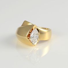 14K Yellow Gold Ring with a 0.65 Carat Marquise Cut Diamond by SolvangAntiques on Etsy https://www.etsy.com/listing/226701036/14k-yellow-gold-ring-with-a-065-carat Thick Band Engagement Ring, Solvang Ca, Marquise Cut Rings, Marquise Diamond Engagement Ring, Engagement Ring Solitaire, Solitaire Diamond Engagement Ring, Marquise Diamond Ring, Ring Marquise, Marquise Cut Diamond