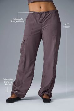 Megastar Cargo Pant - Black | Alo Yoga Functional 4-way Stretch Alo Yoga Bottoms, Sporty Full-length Drawstring Pants, Sporty Full-length Pants With Drawstring, Alo Yoga Relaxed Fit Sports Bottoms, Sporty Drawstring Pants Full Length, Versatile Alo Yoga Bottoms, Alo Yoga Wide Leg Pants With Elastic Waistband, Sporty Alo Yoga Pants With Pockets, Alo Yoga Full Length Sports Pants