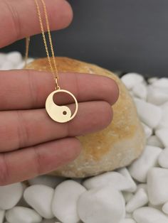 "Yin Yang necklace, ying yang charm, Solid Gold 14k, dainty necklace, delicate necklace, yin yang jewelry, gold coin necklace, disc pendant ♥ Material of pendant and chain: Solid Gold 14k ♥ Packaging: All of our jewelry is beautifully boxed and ready for gifting For more personalized designs take a look here: ♥ www.etsy.com/listing/631444472 ♥ www.etsy.com/listing/645292671 ♥ www.etsy.com/listing/645282627 ♥ www.etsy.com/listing/645285037 ♥ www.etsy.com/listing/645278199 ♥ www.etsy.com/listing/6 Minimalist Round Jewelry For Meditation, Symbolic Round Charm Necklace With Coin Pendant, 14k Gold Round Disc Necklace With Charms, Symbolic Round Charm Necklaces Tarnish Resistant, Symbolic Round Charm Necklace Tarnish Resistant, Symbolic Round Tarnish-resistant Charm Necklaces, 14k Gold Circle Necklace With Coin Pendant, 14k Gold Circular Coin Pendant Necklace, Symbolic Round Necklace With Moon Charm