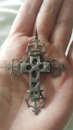 This beautiful cross is is from the Renaissance period, the 17th century. It is silver (tested and guaranteed). There are no hallmarks. The cross is all hand carved and is 2 1/2 inches tall by over 1 3/4 inches wide. The hinged part flips open and there are compartments for holy relics. The top has lost the tongue to keep it shut but this could easily be remedied by a competent goldsmith. Condition is good for its age. Follow me on instagram@jettesjewels. Character Customization, Customization Ideas, Patch Ideas, Pectoral Cross, Dope Jewelry Accessories, Crystal Heart Pendant, Beautiful Cross, Victorian Gold, Dope Jewelry