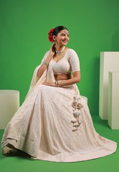 Readymade Embroidered Faux Georgette Lehenga in Off-White This attire with Cotton Lining is Enhanced with Resham and Sequins Work. Crafted in Sweetheart Neck and Half Sleeve Available with a Faux Georgette Choli and a Faux Georgette Dupatta in Off-White. The Choli and Lehenga Length are 12 to 15 and 42 inches respectively Do note: Accessories shown in the image are for presentation purposes only.(Slight variation in actual color vs. image is possible). We sell all kinds of Lehenga and Chaniya Ch Traditional Fitted Set With Pearl Embroidery, Traditional Fitted Sets With Pearl Embroidery, Fitted Sets With Pearl Embroidery And Traditional Drape, Off White Chikankari Embroidery Sets For Reception, Festive Off White Sets With Pearl Embroidery, Festive Cream Sets With Pearl Embroidery, Cream Sets With Unstitched Blouse For Festive Occasions, Traditional Fitted Sharara With Pearl Embroidery, Off White Embroidered Choli For Festivals