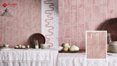 an image of a table setting with pink tiles on the wall and eggs in bowls next to it