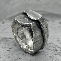 "At the moment we have difficulties with the payment system and we only accept payment through PAYPAL. When placing an order, select PAYPAL as a payment method. Otherwise, we will have to cancel your order. Thank you for understanding! ... UNION Ring Material: 925 Sterling Silver Processing Type: Oxidized Volcanic Sulfur Approximate parameters weight 12-14 gr width 1-1.3 cm DESCRIPTION: The UNION ring is another experiment with simple shapes. These two things are again inextricably linked, turni Brutalist Sterling Silver Signet Ring Gift, Modern Oxidized Finish Rings For Anniversary, Brutalist Sterling Silver Ring For Anniversary, Modern Oxidized Finish Anniversary Ring, Brutalist Silver Rings As A Gift, Union Rings, Custom Handwriting Jewelry, Modern Engagement Ring, Engagement Ring Custom