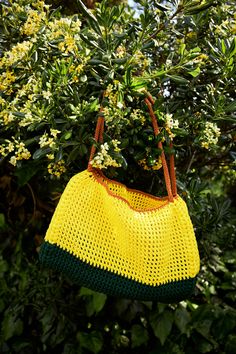 This crotchet handbag is handmade with care and uniquely for you: -Stiffy and durable materials help it maintain its shape and make it roomy.  -It can be carried by hand or on the shoulder.  -A blend of yellow and green injects a vibrant burst of color into the design. -This piece is perfect for everyday uses, grocery trips or beach outings, combining style and functionality. MATERIALS: -Polyester cotton mixed yarn Size:  -Height: 10.5 in -Length: 13.5 in -Width: 5 in -Strap length: 20 in CARE INSTRUCTIONS: -Handwashing with care (recommended) -Do not wash in the washing machine. -Do not use bleach. - Each piece may have imperfections as they are all handmade. Green Crochet Tote Straw Bag, Green Crochet Straw Tote Bag, Rectangular Crochet Bag For Everyday, Rectangular Crochet Yarn Bag For Everyday Use, Rectangular Crochet Everyday Bag, Rectangular Yarn Crochet Bag For Daily Use, Daily Use Yarn Crochet Bag, Yellow Crochet Shoulder Bag For Vacation, Handmade Everyday Crochet Bag