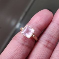 **KINDLY CHECK OUT THE VIDEO OF THE ITEM FOR A CLEARER VIEW**Details of the ring Gem: Rose Quartz Gem size & shape: 8 mm & octagon Center Gem weight: 2.60 carat Finish: matte Gold purity: 14K (58.33% approx.) Gold weight: 2.33 grams total weight of ring: 2.85 grams Fine faceted Rose Quartz gemstone ring set in solid 14K yellow gold in matte finish. The Gold purity is guaranteed and it comes with authentic 14 kt gold hallmark. Since these Rings are handmade, Size Customization is availabl Rhodolite Garnet Ring, Dainty Rings, Ruby Ring Gold, Rose Quartz Jewelry, Rose Gold Quartz, Etsy Gold Ring, Rose Quartz Ring, January Birthstone, Rose Quartz Gemstone