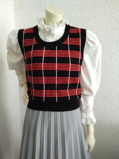 70s checkered vest retro spring vest black red knitted vest plaid vest preppy vest high waist vest tomboy vest college vest acryl elegant vest. GOOD VINTAGE CONDITION BUT THE ITEM IS NOT DRY CLEAN Measurements laying flat : shoulders :37 cm (14,5 inches)  bust :48cm (19 inches)  total length :53 cm (21 inches) Preppy Vest, Checkered Vest, Waist Vest, Elegant Vest, Retro Spring, Plaid Vest, Knitted Vest, Vest Outfits, Knit Vest