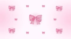 pink bows are arranged in the shape of hearts on a light pink background with smaller ones