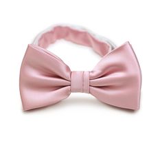 Radiate elegance and grace with the Soft Pink Solid Bowtie. This delicate accessory adds a touch of feminine charm and sophistication to your ensemble. The gentle and subtle pink hue of the bowtie exudes a sense of softness and refinement, making it a perfect choice for romantic occasions and stylish events. Whether you're shopping for mens suits or attending a special celebration, this versatile bowtie effortlessly enhances your look. Let the Soft Pink Solid Bowtie be the finishing touch that c Pink Solid, Timeless Beauty, Mens Suits, Soft Pink, Sense, Pink